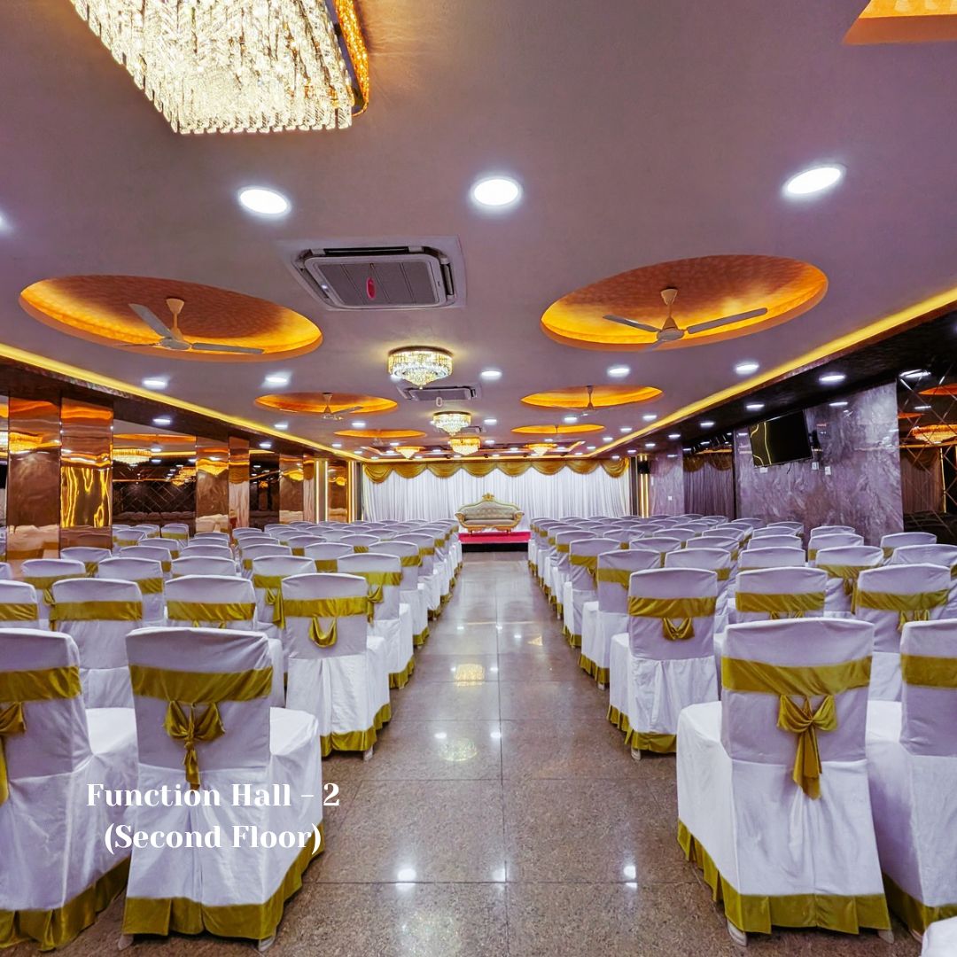 Function Hall 2 on the second floor with gold-sashed seating and bronze ceiling discs